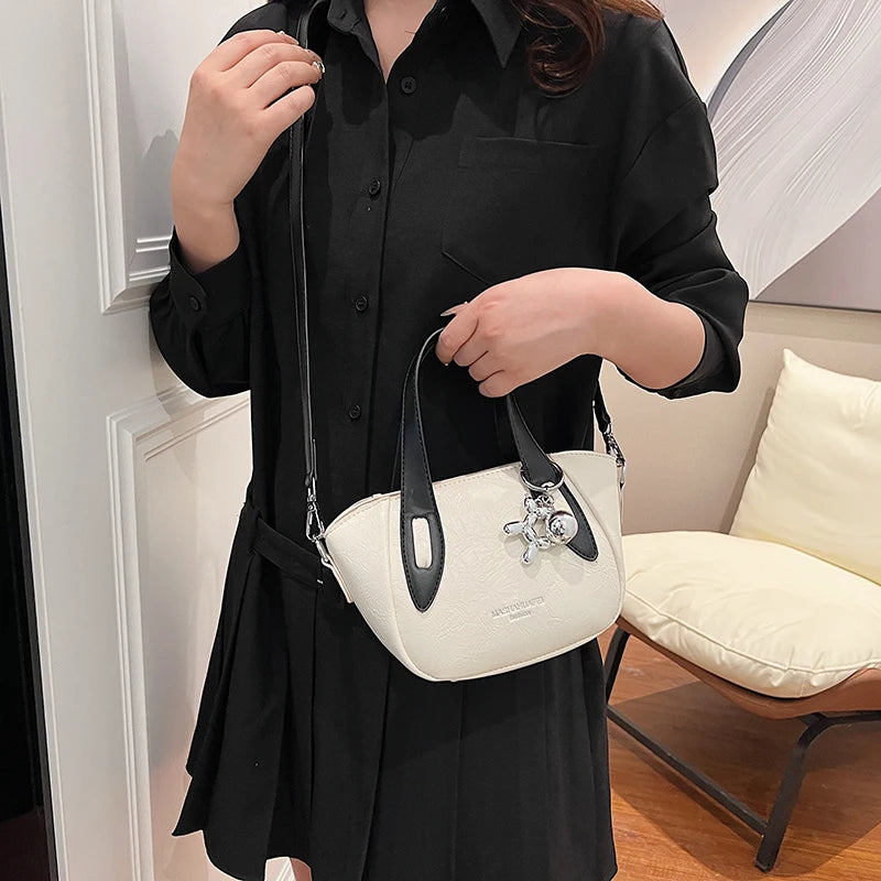 High end and niche solid color bag for women in 2024, new summer fashion crossbody bag, popular this year, portable bucket bag