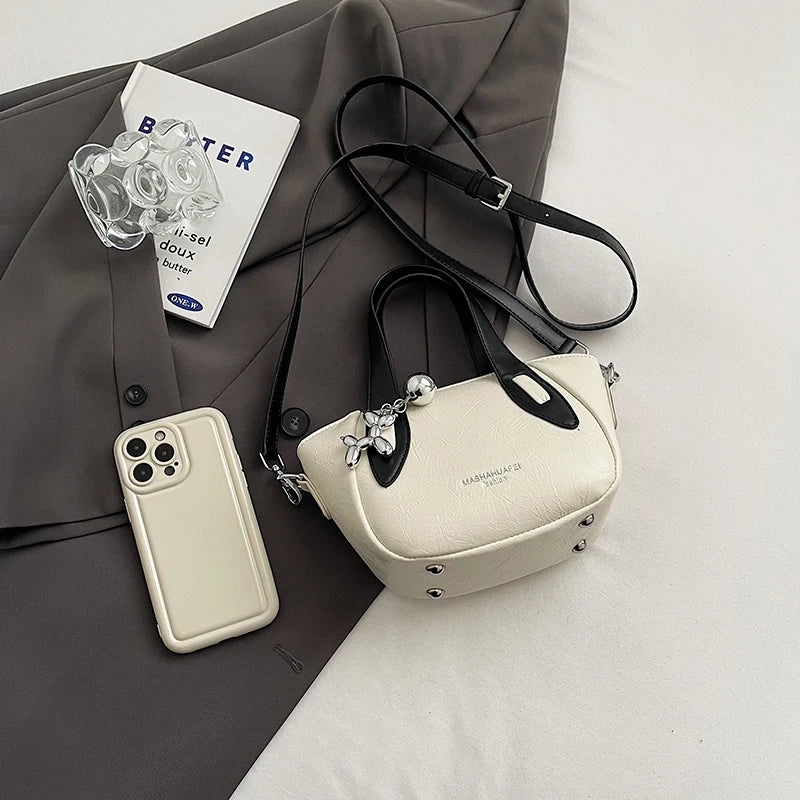 High end and niche solid color bag for women in 2024, new summer fashion crossbody bag, popular this year, portable bucket bag