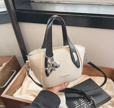 High end and niche solid color bag for women in 2024, new summer fashion crossbody bag, popular this year, portable bucket bag