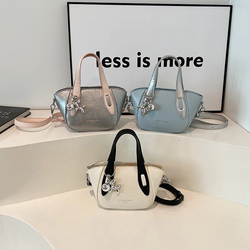 High end and niche solid color bag for women in 2024, new summer fashion crossbody bag, popular this year, portable bucket bag