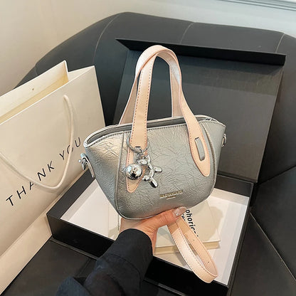 High end and niche solid color bag for women in 2024, new summer fashion crossbody bag, popular this year, portable bucket bag